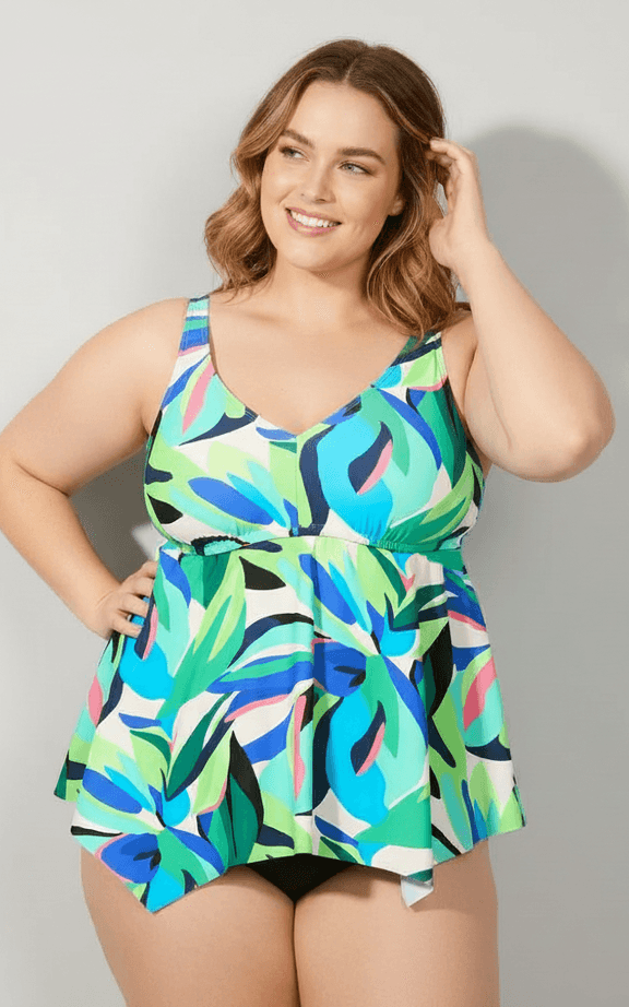 Tankini Swimwear Set featuring a colorful abstract print top with an asymmetrical skirted hem and black matching bottoms, suitable for plus sizes.